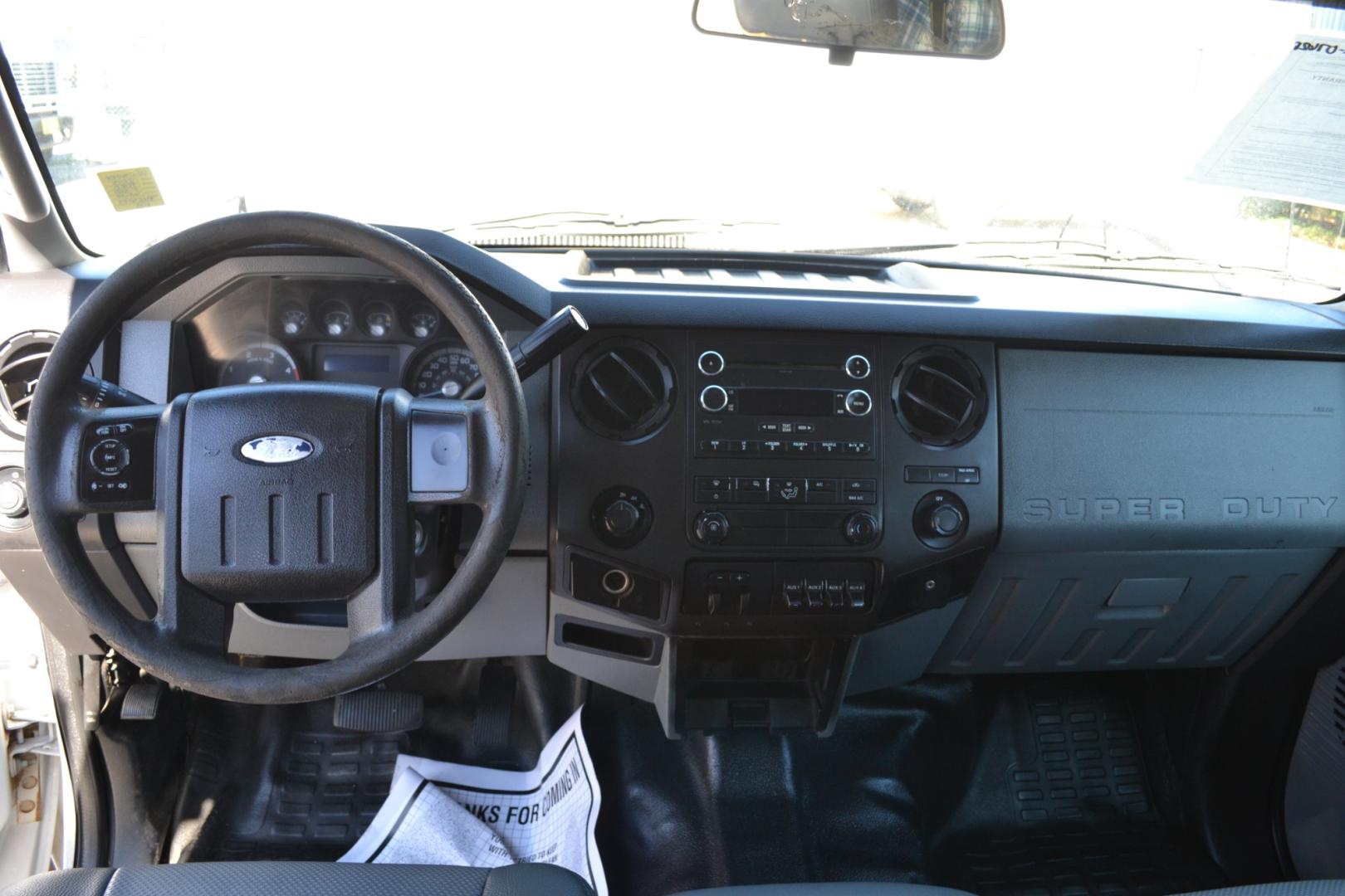 2013 WHITE Ford F550 with an POWERSTROKE 6.7L DIESEL engine, AUTOMATIC transmission, located at 9172 North Fwy, Houston, TX, 77037, (713) 910-6868, 29.887470, -95.411903 - CREW CAB, 11FT FLATBED, BUMPER PULL HITCH, 19,000LB GVWR , 4X4, POWER WINDOWS , LOCKS & MIRRORS, CRUISE CONTROL, COLD A/C - Photo#11